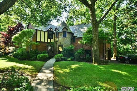 Majestic Renovated Turreted Tudor On 1/4 Acre In The Village Of Great Neck Plaza. Living Room With Fireplace, Formal Dining Room, Screened Porch. 4 Bedrooms, 3 Full Baths, Finished Basement, 2 Car Attached Garage. Near Town And The Lirr.