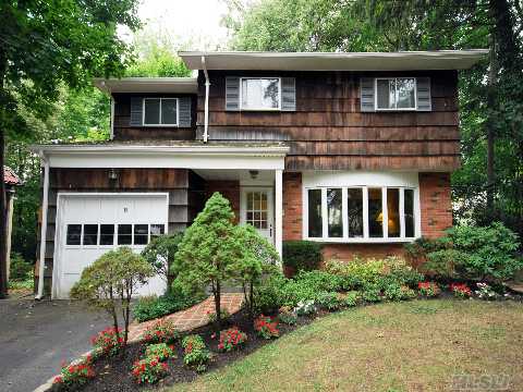 Wonderful Brick/Cedar 4Br Colonial On A Quiet Cul-De-Sac In The Village Of Thomaston. Lr With New Bay Window, Formal Dr,Eik & Powder Room. Den Has A Skylight & Sliding Doors Leading To Wooden Deck W/Built-In Seating Overlooking Lrg Backyard. In Addition To Garage, There's A Lrg Storage Shed. Located On A Beautifully Tree-Lined Street Near Lirr.