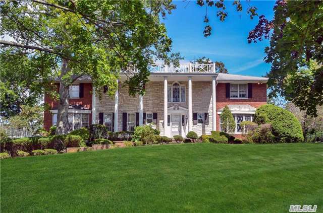 Prime Location. Stately Gorgeous Columned Brick Colonial In Beautiful Village Of Kings Point,  Built By Major Builder For His Own Family. Right Of Way To Long Island Sound Beach. This Home Offers 6 Bedroom, Elevator. 3 Car Garage, Generator And Many More. Beautiful Panoramic Water Views Of Bridges. Flat Square 1 Acre Property.