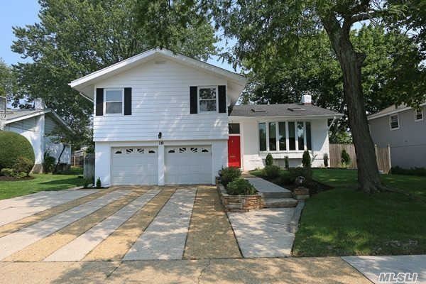 Split Style Home In East Birchwood Of Jericho In Sought After Syosset School District. Den With Brick Fireplace, Spacious- Open Layout, Eat-In-Kitchen With Sliding Doors To Outside Wooden Deck. Master Bedroom W/Master Bath And His/Her Closets. Great Location, Must See!