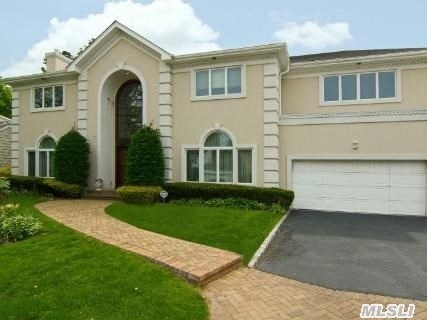 Beautiful All Renovated Contemporary Colonial. This Stunning Home Built With The Finest Materials Offers 4800Sq Ft. Of Living & Entertaining Space. A 22' Soaring Ceiling Leads The Way To Spacious Rooms. Dramatic Rotunda Style Den,  Mahogany Library & 750Sq Ft. Granite Eik. Must Be Seen,  Private Landscaped Property.