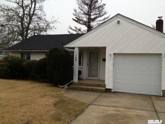 Mint Condition Ranch  This Home Has A New Kitchen And Bath,  New Central Air Compressor,  And New Heat.  Beautiful Contemporary Open Floor Plan With Wood Flooring And Cathedral Ceiling In Living Room. Oversized Fence In Yard