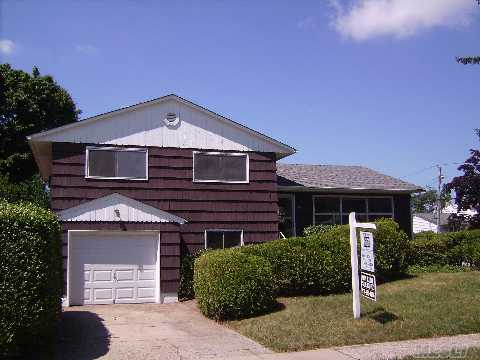 Jericho Schools!!!Jackson Elementary.  Large White Birch Split With Full Master Bedroom & Bath. Expanded Den, Great Value. O/S Property. Private Rear Yard. 