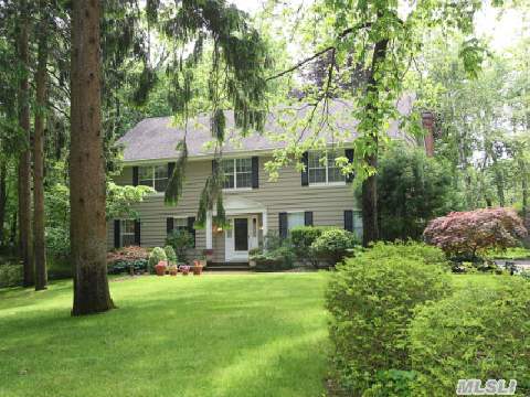 Picturesque Country Colonial,  Perfectly Set On Serene Professionally Landscaped Acre. Gracious Open Layout,  Ideal Home For Entertaining In Today's Life Style.  Prestigious Syosset School District.  Priced To Sell. Property Taxes Do Not Reflect Star Exemption Of $1, 336.40