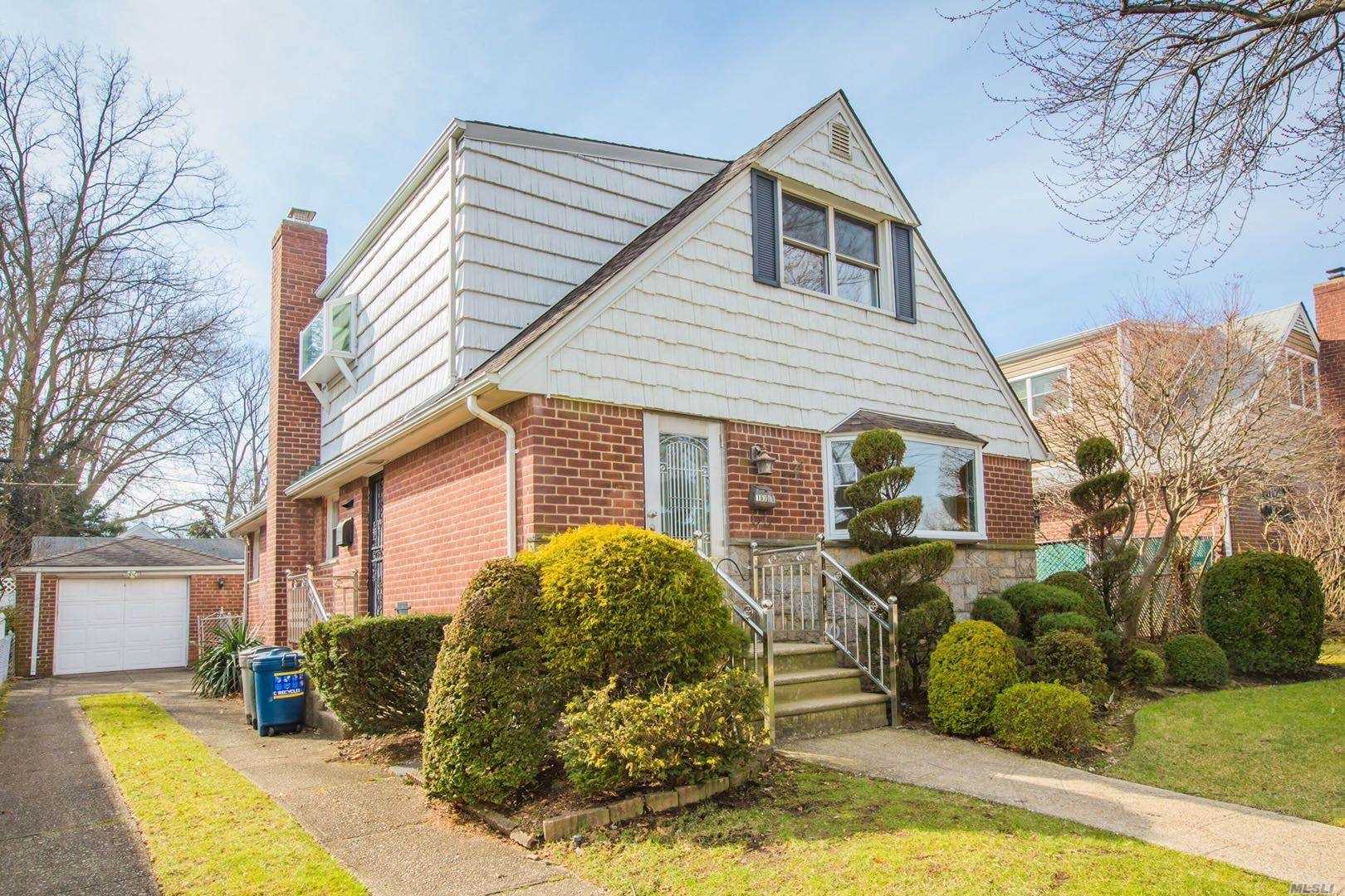 4-Bedroom, 2.5 bath detached 1-family expanded cape sitting on 4, 180 sqft lot. Full finished basement. Near Bowne Park, Q16 bus stops. Short drive to area shopping plazas. Great schools: P.S.21, P.S.184, J.H.S. 185.