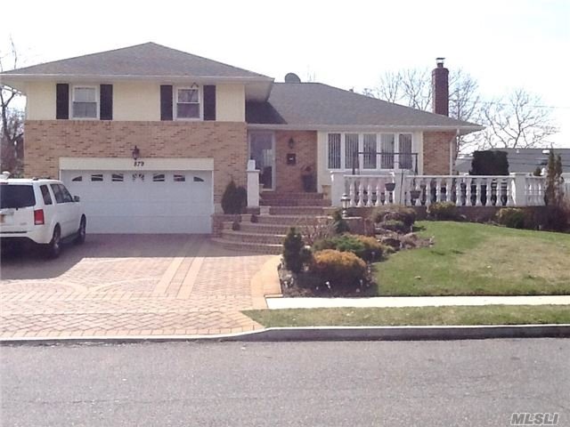 Mint Expanded Split In Salisbury Estates/East Meadow Schools Includes Updated Kitchen With Granite Countertops & Gas Cooking, Updated Baths, Hardwood Floors, Beautiful Brick Driveway, Walkway, Porch And Patio In Back.