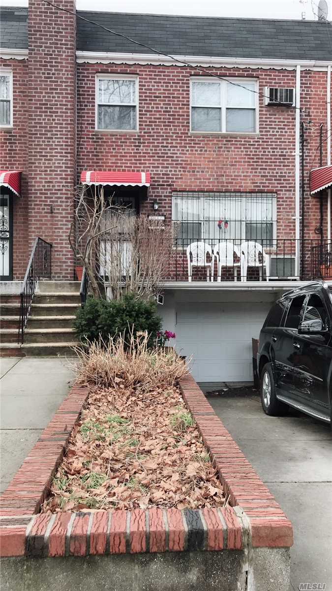 A Well-Maintained Brick Townhouse Located On A Quiet Street. This House Features A Large Living Room, A Formal Dining Room, And An Eat-In Kitchen. It Has A Big Master Bedroom And A Huge Bathroom, One Car Garage And Private Driveway That Can Park Two Cars. Walking Distance To E, F, G, R, And 7 Trains. Price To Sell. Will Not Last Long.