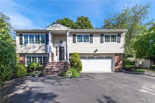 Welcome To Your Personal Oasis In The Heart Of Syosset. Beautifully Renovated Home On The End Of A Cul-De-Sac. Move Right Into This 3 Bed 2, 5 Bath Home. Everything Updated Including Kitchen W/Breakfast Bar & Ss Appliances, Roof W/Warranty, Anderson Windows, Trex Deck, Heated Pool & Hottub, 200Amp Electric And Much More. Close To Lirr, Highways. Village Ele & South Woods Ms