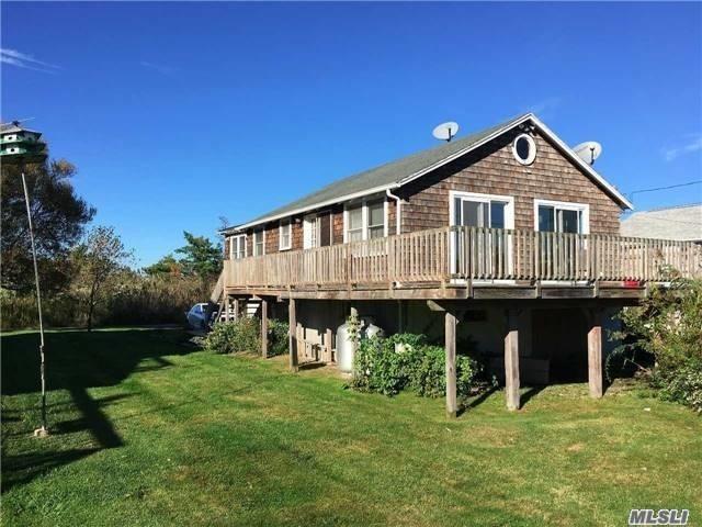 Don&rsquo;t Miss This Home W/Water Views & Beach Reeds From Your Living Room Sliding Doors & Sunny Deck! Totally Updated Tumbled Tile Bath & New Tiled Floors In Kitchen & Living Room For Easy Beach Living! Updated Appliances Throughout. Taxes Include $3600 Land Lease.