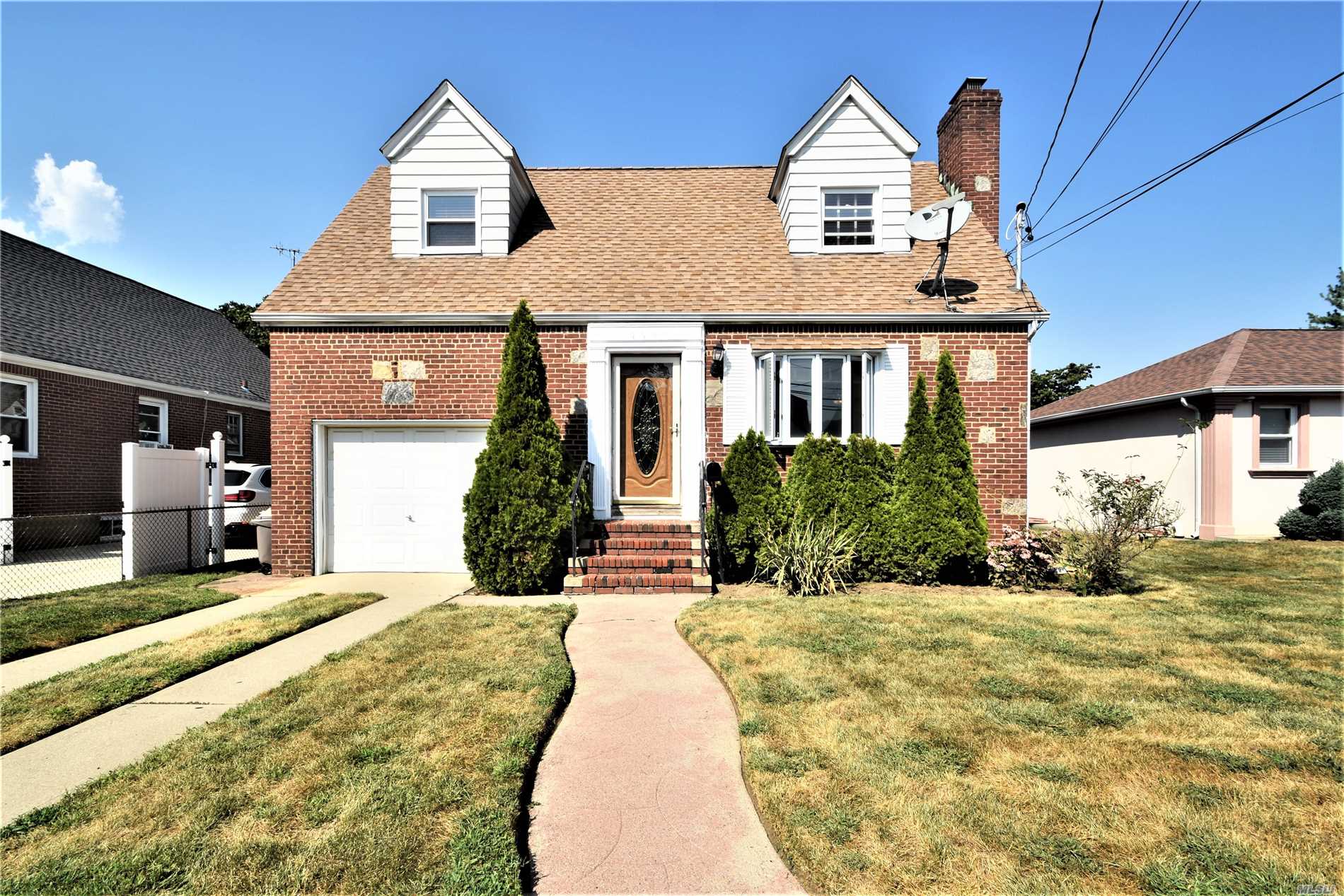 Don&rsquo;t Miss Out On This Opportunity To Own This Well Maintained Cape Featuring A New Roof, New Windows, Stainless Steel Appliances, Updated Electrical Panel And More!!! This Home Is Close To 2 Train Lines With Direct Access To Penn Station And Brooklyn Within 31-38 Minutes, 10-15 Minutes To Jfk Airport, Close To Multiple Parkways, Shopping, Dining And Parks! Dog Lovers The Village Has A Dog Park As Well!!!