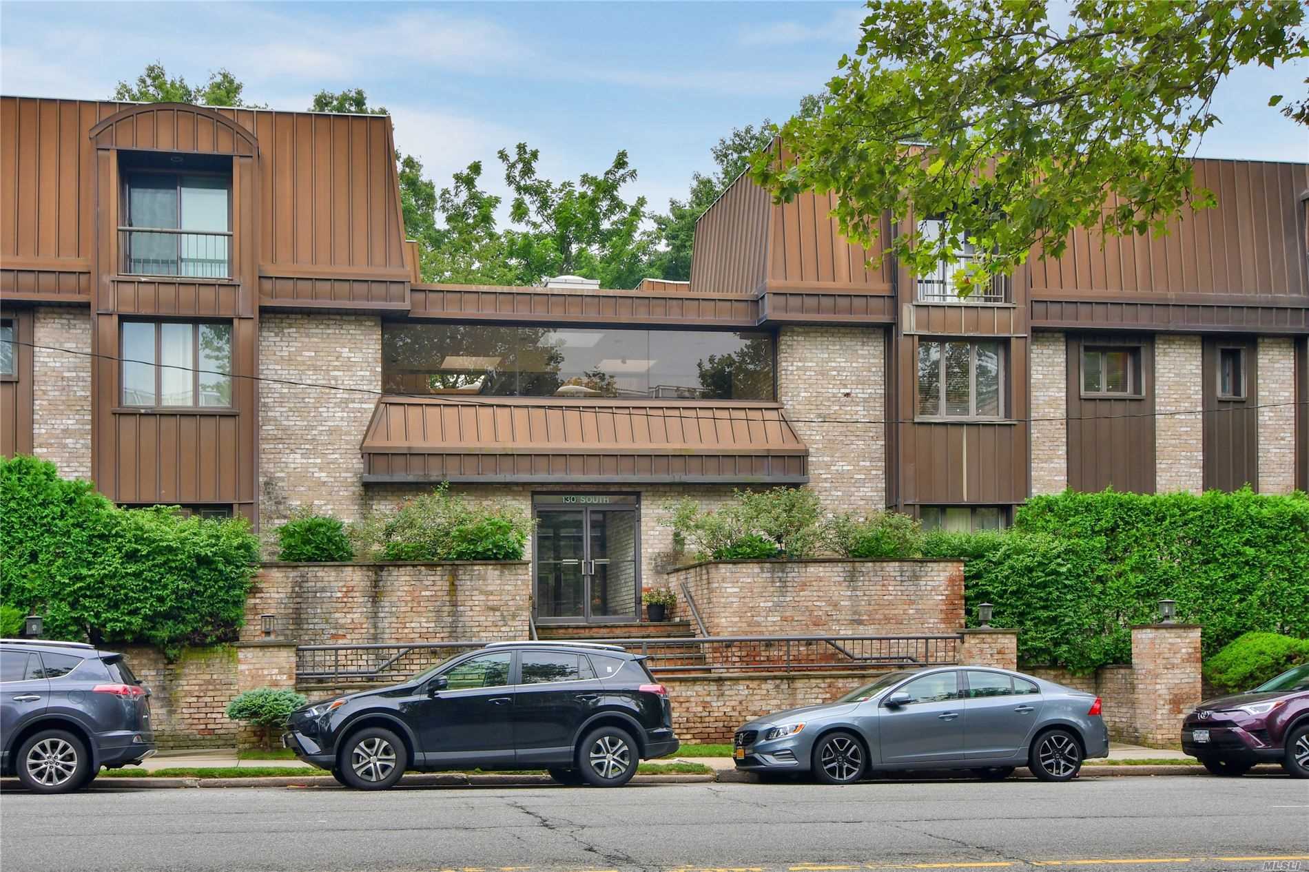 Totally renovated Great Neck 2 Bedroom/2.5 Bath condo. This beautiful Duplex has Cathedral ceilings, skylights, living room with fireplace, 2 indoor garage spaces, close to shops, LIRR, buses and restaurants. Great Neck south school district.