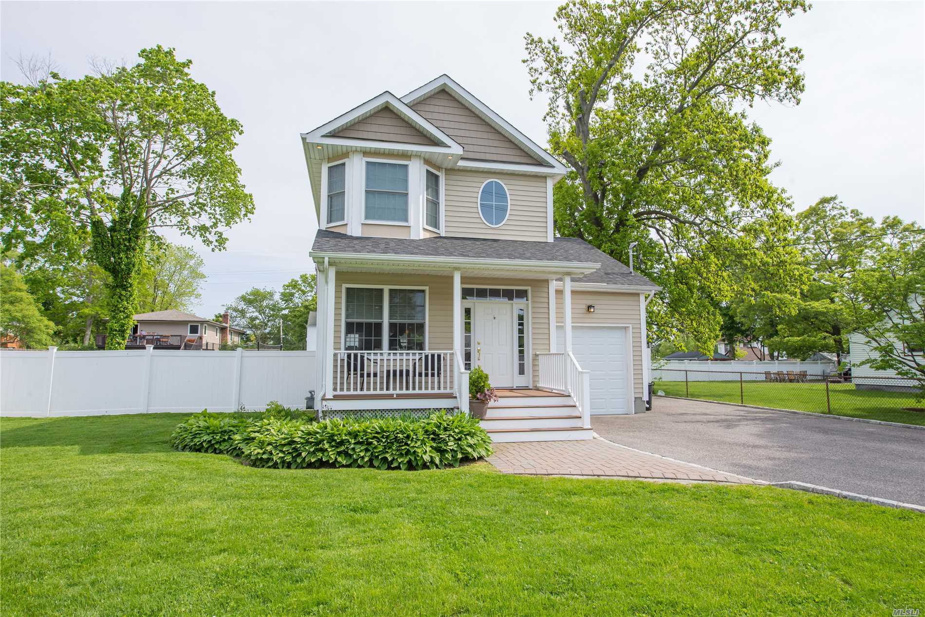 Diamond 5 Year Young Colonial W/Open Floor Plan, Living Rm, Formal Dining Rm & EIK W/Island, Granite Counter Tops, Stainless Steel Appliances & Gorgeous Maple Cabinets. Oak Hardwood Floors On 1st Floor. High Efficiency Furnace & Hot Water On Demand. 20x20 Deck & Partial Basement. Beautiful Backyard & Front Porch. A Must See!