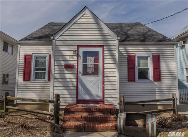 Traditional Cape With Entry Foyer, Living Room, Separate Dining Room, Kitchen, Bath And 2 Bedrooms On 1st Floor. 2nd Floor Has 2 Bedrooms & Half Bath. Hardwood Floors Throughout. Large Basement With Newer Gas Heating System. Private Backyard, Detached Garage. Incorporated Village Of Rvc. Oceanside Schools.