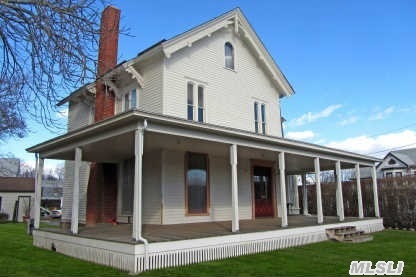 Possible 2 Family Victorian In Heart Of Maritime Village Of Greenport W/Garage Building. Grand Entry Foyer, Ballroom Sized Living Room W/Fireplace, Parlor W/Fireplace, Formal Dinning Room, Eik And Approximately 5 Bedrooms W/3 Baths. Would Make A Wonderful B&B. Motivated Seller.