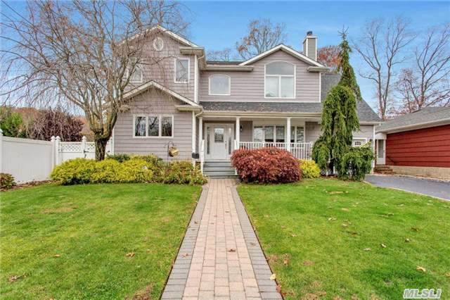 This Home Was All Expanded And Professionally Decorated In 2005.  Located In The Prestigious Massapequa Park Area Where You Are Close To Transportation And Stores.  A Warm And Comfortable Home With Lots Of Charm.  Enjoy A Family Gathering With A Roaring Fire On A Cold Winter Night.  It Can't Get Better Than This. Master Suite And Bath Fit For A King + Queen.