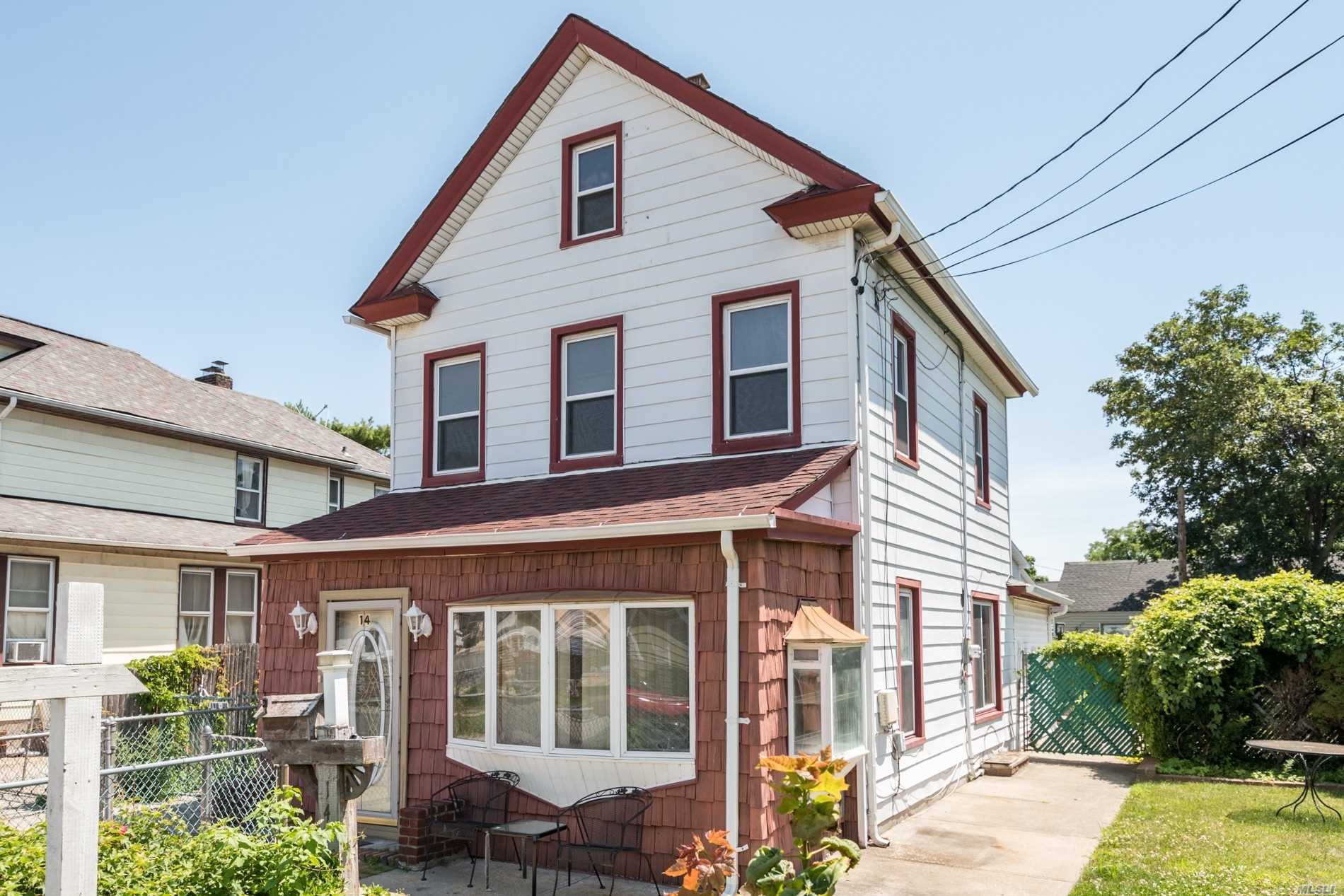 4 bedroom colonial with a walk up attic in the heart of inwood close to all !!