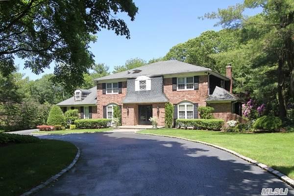 Charming Brick Colonial Impressively Sited On A Gorgeous Flat 1.03  Acre With Heated Gunite Pool,  Cottage-Style Pool House,  And Tennis Court With Seating Area,  Located In The Gates Of Woodbury. This Home Offers 5 Bedrooms,  3.5 Bths,  Den. 2-Car Att And 2 Car Det For The Car Enthusiast. Perfect Country Club Setting And Fabulous For Entertaining.