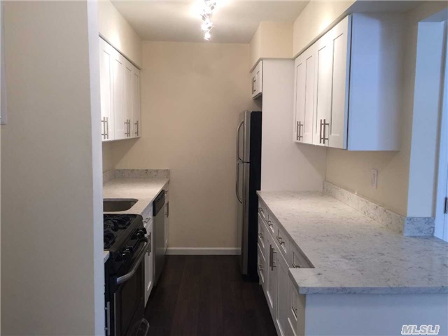 Newly Renovated, New Wood Floors Throughout, New Kitchen, Custom Cabinets, Quartz Countertops Stainless Appliances, New Bathroom, Marble Floors. Complex Has Indoor And Outdoor Pool. Fitness Center.