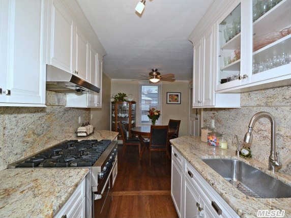 Custom Kitchen W/Granite Counter Tops & Backsplash,  Stainless Steel Commercial Appliances(Viking Stove/36 Self Cleaning Oven),  New Garbage Disposal,  New Electric & Panel/New Plumbing/New Windows W/Custom Treatments/Kohler Fixtures/Custom Closet System/Crown Molding,  Oak Wood Floors Throughout,  Terrace,  Outdoor In Ground Heated Pool & Sun Deck. Maintenance $1280.86 W/ Star