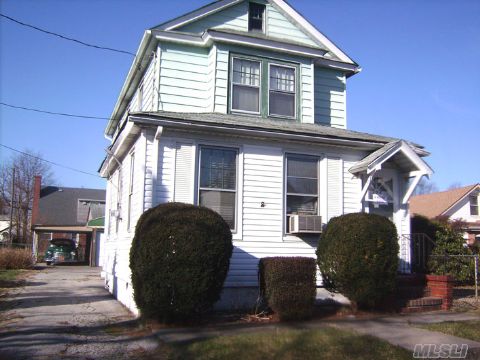 Legal Two Family Home On An Oversized Lot.  Features 2 Bedrooms, 2 Baths, Eat-In-Kitchen, Living Room, Unfinished Basement, 1.5 Det Garage. Close To Shopping, Transportation, Plus Car Port.