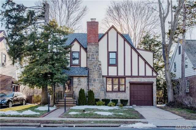 Architecturally Beautiful Stone, Brick And Timber Tudor. Lovely Living Room With Twinkling Diamond Stained Glass Window And Fireplace. Great Kitchen Facilities, Including Refrigerator, Microwave, And So Forth. Finished Basement, Private Backyard. Walk About 10 Minutes Up To Lirr, Near Supermarket, Banks, Library, And So On.