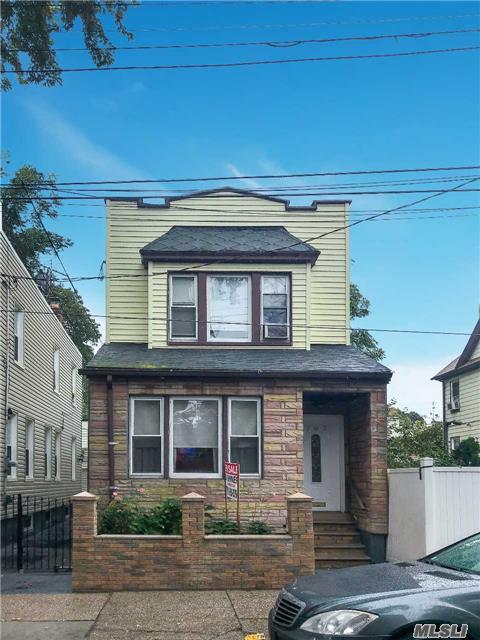 Remarkable Cozy Home In Great Location. Walking Distance To The J. Train, Shopping Schools Etc. This Home Features 3 Bedrooms A Huge Kitchen, Formal Dining And A Full Living Room With Hardwood Throughout And A Finished Basement, Also A New H2O Tank Seller Is Motivated.