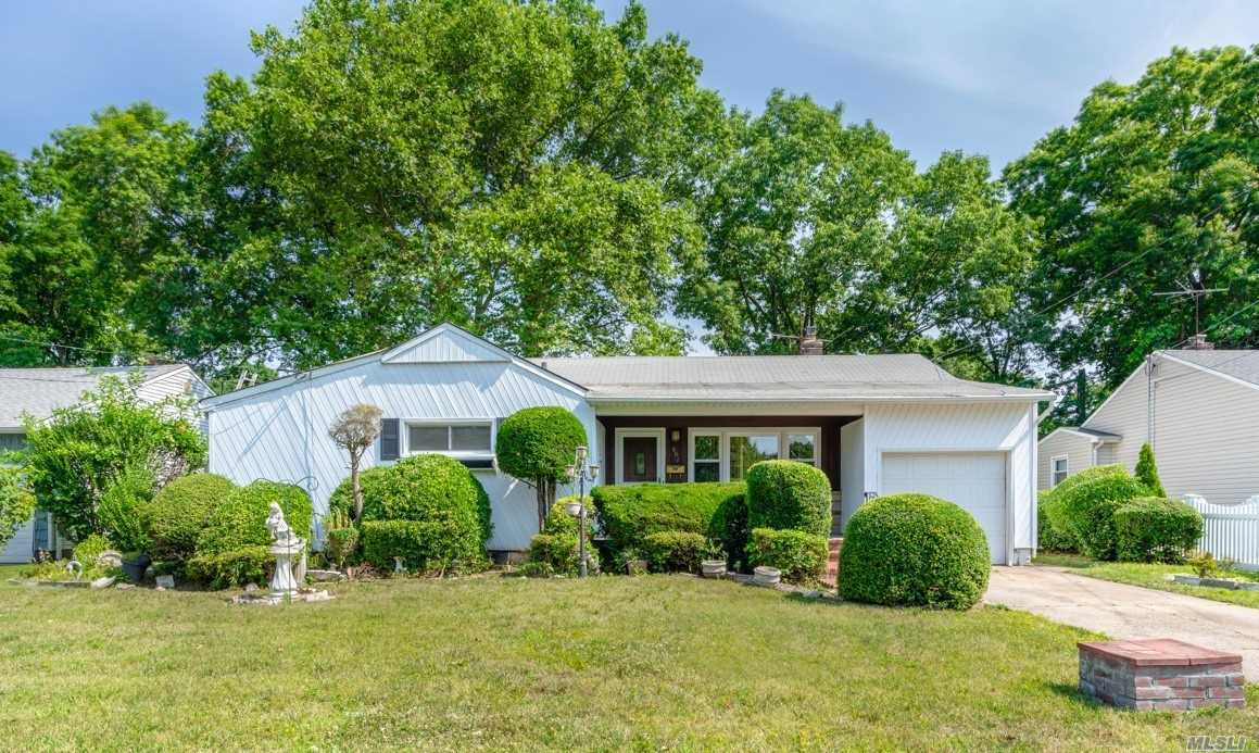 This is great starter home -Entry foyer with a coat closet, Living Room and Formal Dining room with Hardwood floors, eat in kitchen, Master bedroom w/half-bath, full finished basement and private back yard for entertaining.