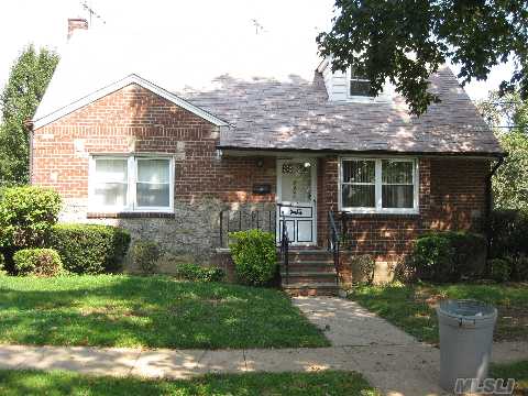 This Beautiful Brick Wide-Line Cape Is New Hyde Park School District. The First Floor  Has Kit, Living Room And Dining Area With 2 Bedrooms And A Full Bath. The Second Floor Has 2 Bedrooms. The Basement Is Finished With A Full Bath. It Also Has A Detached Garage,  This Home Is Near To Shopping And Transportation.  