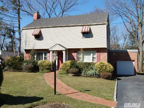 Exceptional Center Hall Colonial On  Oversized Property In Exclusive Village Of Flower Hill,  Great Open Layout,  Living Rm/Fireplace,  Formal Din. Rm,  Large Den/Fireplace And Bar,  New Eat In Kitchen,  Wood Floors.  Port Washington Train Sticker!A Gem! Cannot Be Missed.