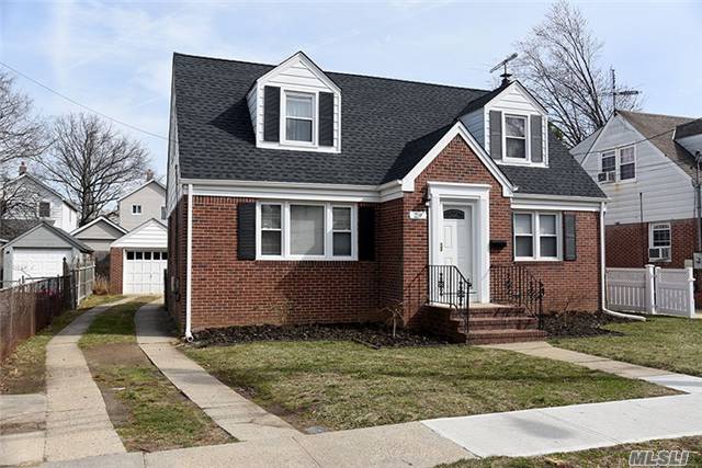 Charming Brick Cape Style Home Sitting Mid-Block In Floral Park. This Adorable Home Has 4 Bedrooms And 2 Full Baths, Featuring Hardwood Floors Throughout, A Bright And Spacious Living Room, An Eat In Kitchen/Dining Room, And Garage In Back.