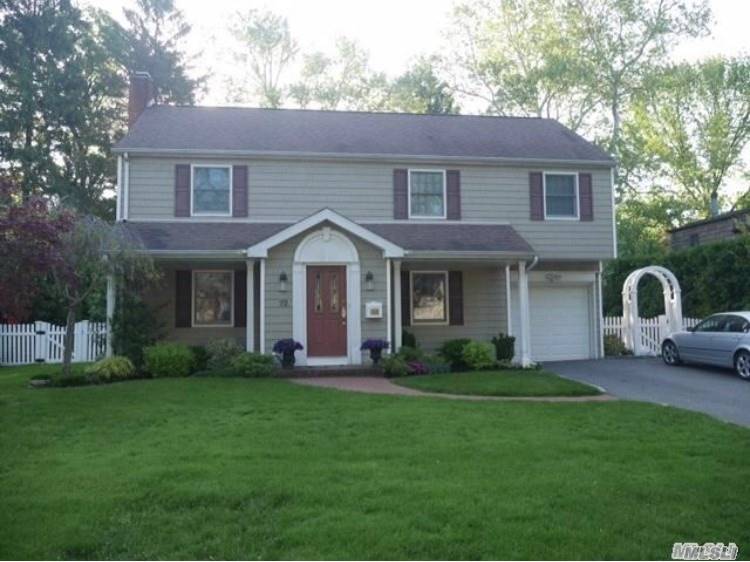 Updated & Move In Ready! Expanded Strathmore Colonial. Wood Floors, Open Kitchen/Family Room, Quartz Counters & New Appliances. Four Bedrooms, 2.5 Baths. Recently Updated To Gas, New Hot Water Heater & Burner, New Cesspools, Gas Fireplace. East Hills Pool/Park & Roslyn Schools.