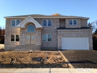 New Construction!Jericho Sd! Magnificent 3725 Sq Ft, 5 Bdrm/3.5 Bth Ctr Hall Brk Front Colonial W/Superb Trim Details & Craftsmanship! Dbl Hgt Entry Leads To Open Layout W/Spacious Lvrm & Fam Rm W/Fpl, Fdr, Magnificent Tile Eik W/Gas &Granite Island & 5th Bdrm &1.5 Bths. Grand Master Ste W/Huge Closet & Lux Fbth &3Lg Bdrms, Fbth.Seaman Elem- Interior Pics Are Not  Exact Model.