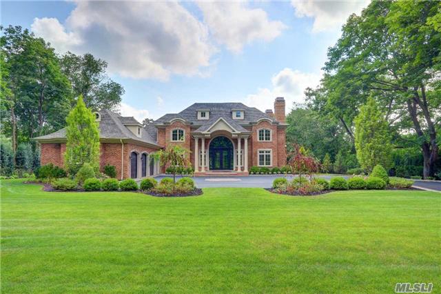 Exquisite Custom All Brick Colonial Situated On 2 Acres! Grand Marble Foyer, Breathtaking Millwork, High End Finishing Touches. Bridal Staircase, Custom O/S Gourmet Kitchen, Lg Lr, 5 Br 5 1/2 Bth. 3 Fireplaces, Elevator, Full Finished Basement W/9Ft Ceilings. Movie Theater, 3 Car Garage, Gunite Pool. Radiant Heat. For The Buyer Who Knows Quality.