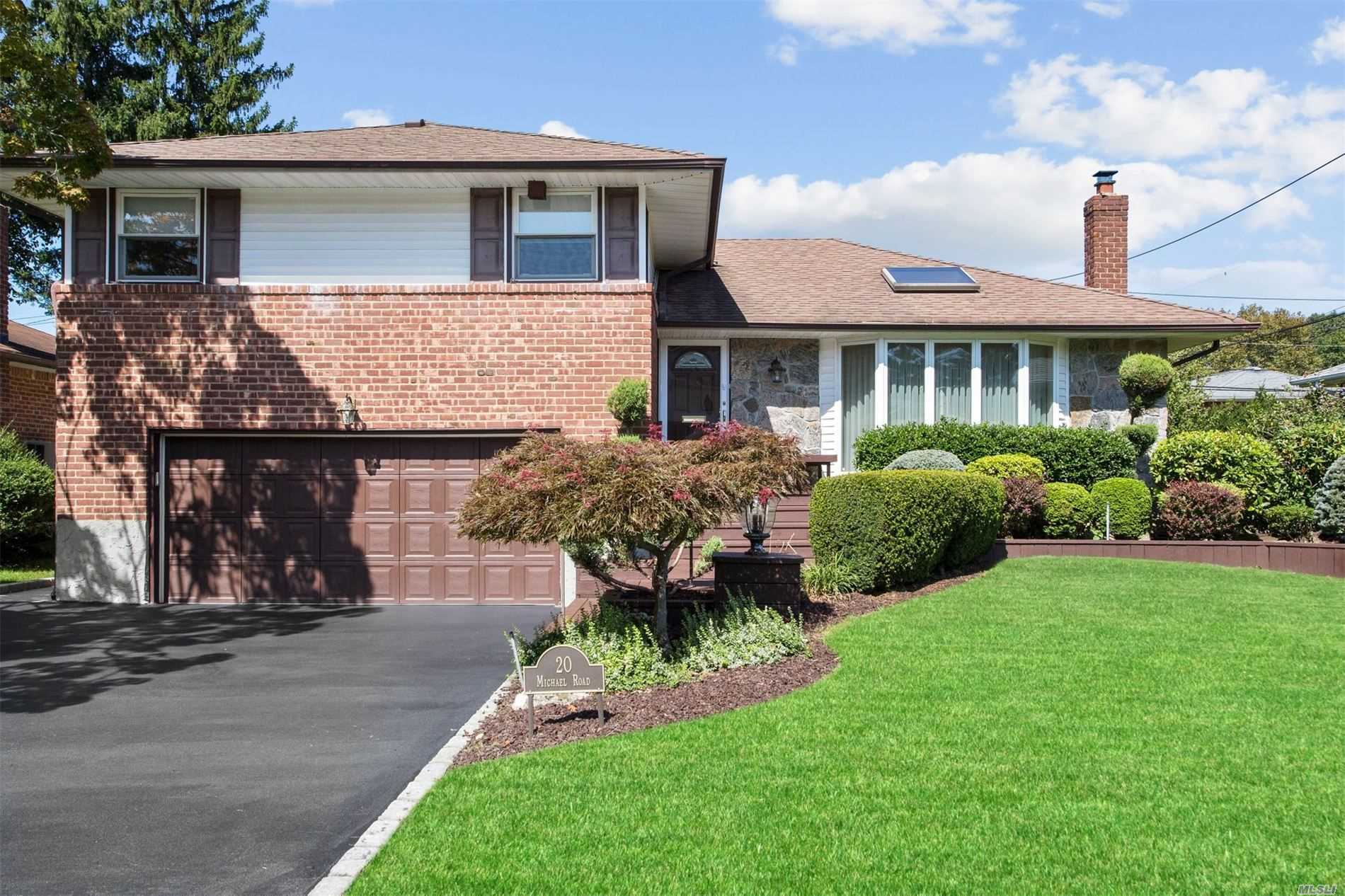 Immaculate Birchwood Park Brick Split Level in acclaimed Syosset schools. 3 Bdrms, 2 1/2 updtd bths. Modern updtd ktchn w/ gas stove, granite cntrs, solid maple custom cabinets & tile floor. Cozy den with pwder rm, newly re-finished basement storage area, with laundry, utilities & cedar closet. Many amenities inc: 3 sky-lights, hardwood flrs, Energy-Efficient updates, solid wood interior doors, new frnt/storm door, 2 large Trex decks & 200 amp elec. Clse to prkwys, transportation & shopping.