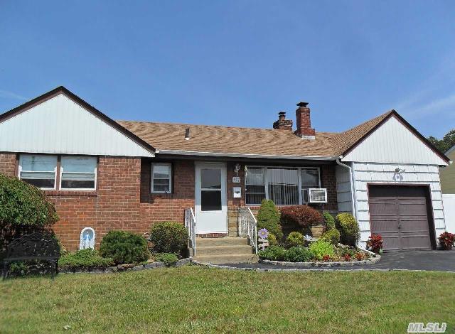 Excellent Ranch In Massapequa Park Schools. This Home Has Living Room W/Fireplace,  Hardwood Floors,  Three Bedrooms,  2 Baths,  Basement And Garage. Must See! ***Taxes Must Be Verified***