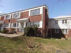 2 Br 1 1/2 Bath Duplex W/Attic & Private Backyard Patio. Maint.Includes Heat, Hw, A/C,Dw, W/D And Taxes. Granite Kit,Updated Baths,Hw Flrs & Ceramic Tile,Express Bus,Near Shopping,Lirr. Open Floor Plan Inc Req. 72X Mo. Maint+24X Mo Mtg Payment