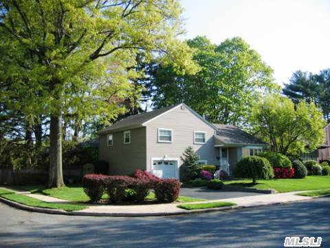 Expanded Corner Split Home On An 86 X 100 Lot, Fenced & Landscaped With Paver Patio & Bi-Level Deck, Custom Frame Shed, Wood Burning Fireplace With Marble Hearth, In Ground Sprinkler System, Large Walk-Up Storage To Attic. Interior Square Footage 1,760 Sq Feet