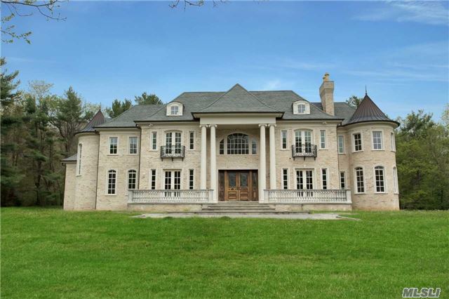 French Chateau Style Brick Colonial With Incredible Architectural Details.