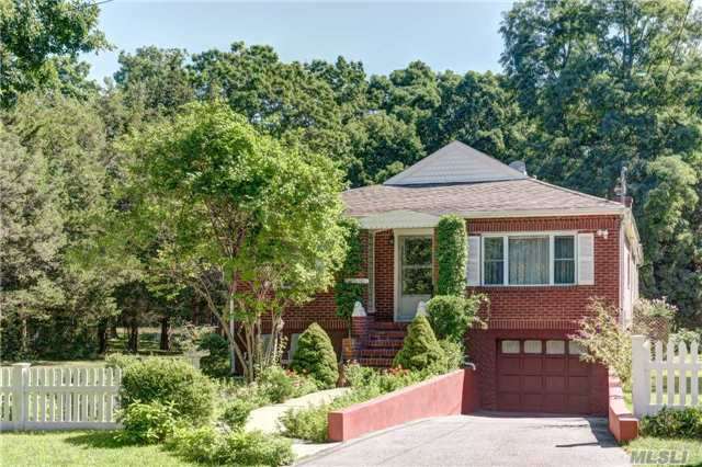 Turnkey Mid Century Brick Bungalow On Private Half Acre With Sound Beach At The End Of The Street. Great For Entertaining This Home Features An Open Concept Dining Room, Kitchen, Family Room With Gas Fireplace And A Formal Living Room. A Large Wrap Around Deck Overlooks The Spacious Yard. A Must See.