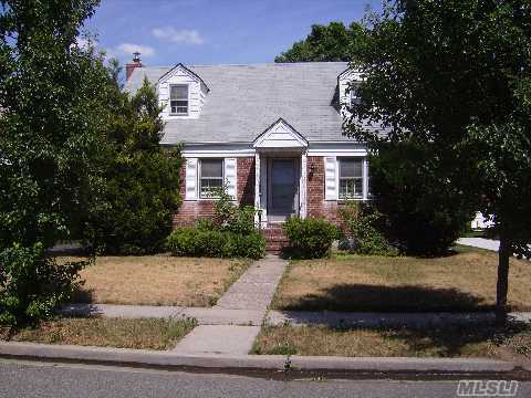 Welcome To This Wide-Line Cape In The Prestigious Herricks School District #9. This Lovely Home Is Located Mid-Block On A Beautiful Tree-Lined Street And Close To All. Great Opportunity To Renovate And Make This Your Own. Priced To Sell-Don't Miss Out-Sold As Is!