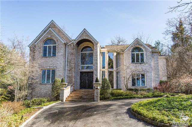 Rare Find! Built Without Compromise, This 4700Sf Custom Colonial Reflects Only The Best! Boasting Custm Millwork, Soaring Ceilings, Grand 2Story Entry W/Custm Staircase, 650Sf Gourmet Eik W/S.S Appliances. Breathtaking & Bright Mst Suite W/Dressing Area & Custm Closet. 4Car Garage & Whole House Generator. Many Upgrades-Too Much To List! Close To Roslyn Village. Roslyn Sd