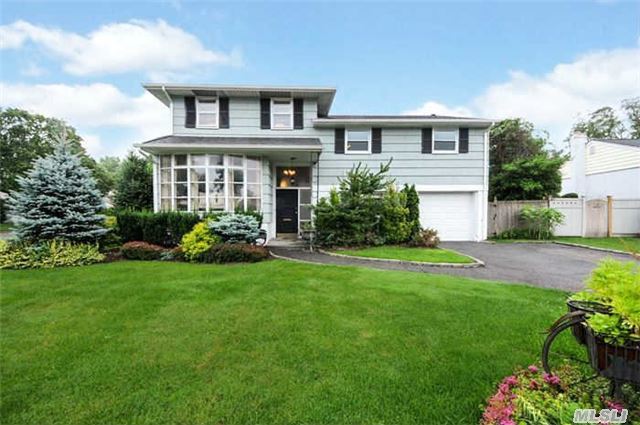 Successful Tax Reduction Of 23.8% .If Applied The Taxes Will Be Approx 15, 572.69.See Attached Letter. Fabulous 5 Bedroom Expanded Split In Syosset Woods, Lovely Oversized Yard W/ Deck Off Kitchen. Gas Heat (3 Zone)& Cooking.Sunny Very Well Maintained Home. New Heating & Newer Roof. School District 2 - Woodbury/Syosset Updated 200 Amp Electric With Generator For House