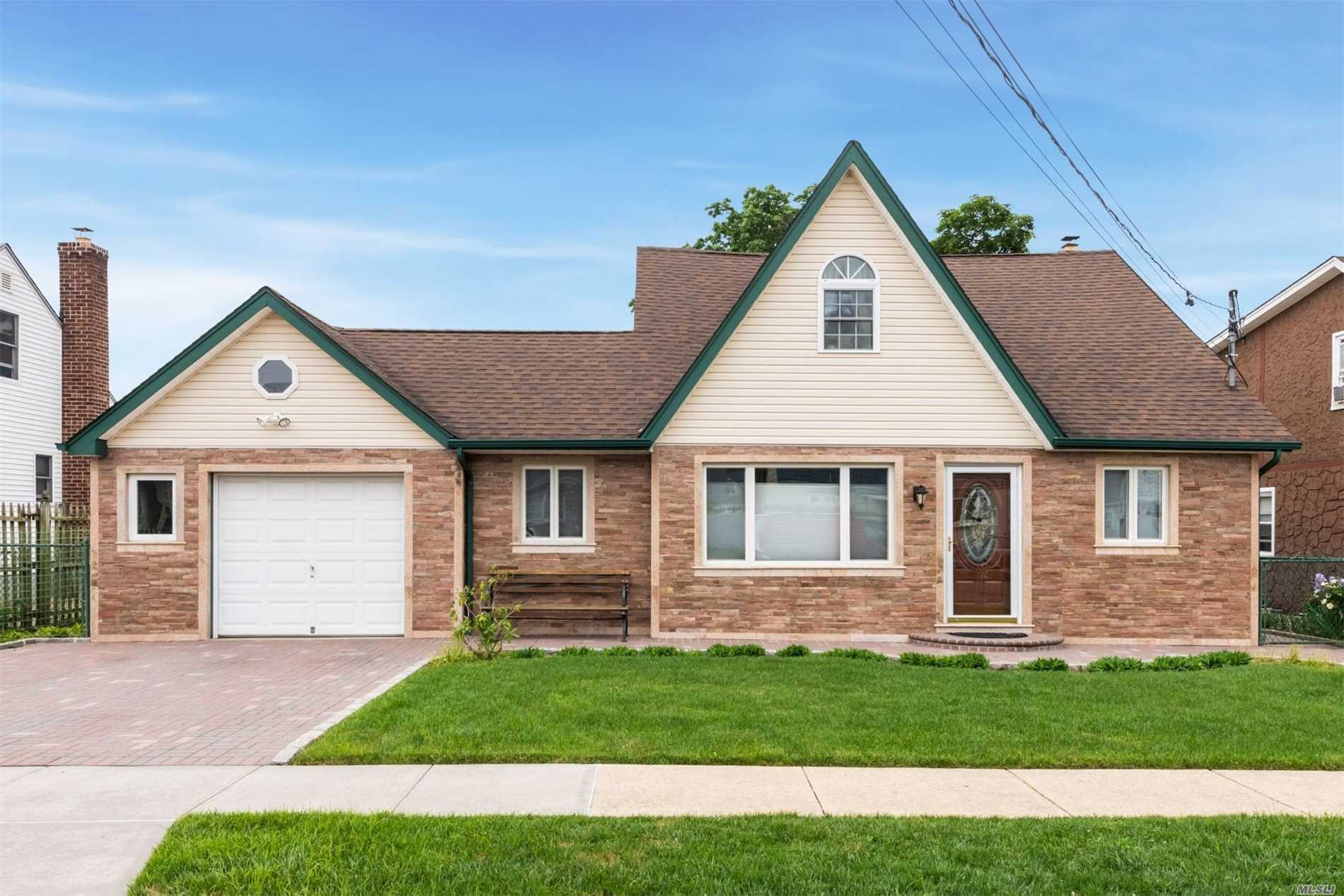 Modern Design Elements Blend Seamlessly In This Newly Renovated 5 Bedroom, 3 Bath State Of The Art Rear Dormer-Ed Home. Rich Wood Kitchen With High Ceilings Open To A Great Room Which Defines The Ultimate Standard For Today&rsquo;s Lifestyle. Spacious Finished Basement W/Outside Entrance Leads To A Fenced Yard W/Brick Patio.Multiple Improvements Include, New Anderson Windows, Sheetrock, Plumbing, Electrical, Heating, 3 Zone Central Air, Igs, 1.5 Garage.Easy Access To Highways And Public Transportation.