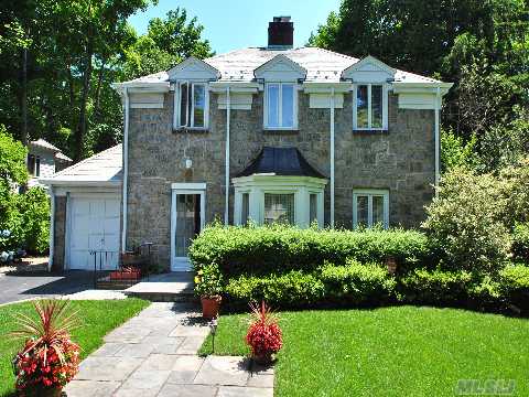 Welcome To This Gorgeous Stone 4 Bedroom 2.5 Bath Colonial Situated In The Village Of Great Neck Plaza. This Wonderful Home Is Steps From The Wyngate Park, Lirr And Town. Private Prof Landscaped Property, All New Windows, Alarm, All Updated A Must See. It Is Zoned For Great Neck South Schools.