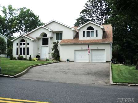 Luxurious, Custom-Designed, Sun Drenched & Spacious 4 Bedroom Center Hall Colonial Featuring High Ceilings, Hardwood Floors Through Out, Traditional Detailing And Moldings, Great Entertaining Flow, Glorious Updated Kitchen W/Breakfast Area, Formal Living Rm, Dining Rm And Master Br W/Jacuzzi Bath. Finished Basement With Lots Of Closets, Very Big Backyard And 2 Car Garage.