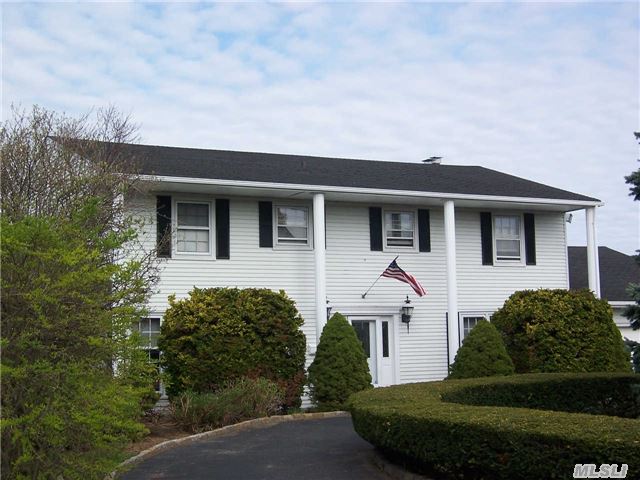 True Center Hall Colonial. New Chef's Eik, Fdr, Den W/Fireplace, Large Lr, 4 Brs, 3 Fbths. New Inground Pool, 100 Ft Of Bulkheading & Boat Slip. Bayviews And Western Sun. Beautiful!
