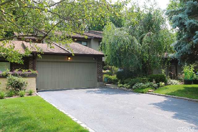 Welcome To This Beautifully Renovated Designer Showcase! This Home Boasts Hardwood Floors,  New Kitchen Cabinets Stone Counter Tops With A Tasteful Glass Back Splash. New Spa-Like Hall With Tile And Glass Inlay. Fire Place In Living Room With Access To A Privet Deck In A Tranquil Setting.