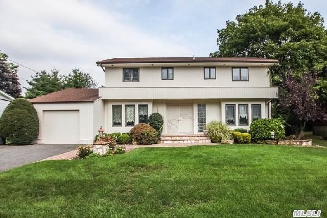 A Well Maintained And Immaculate Colonial Features 4 Brs,  2.5 Baths,  Den W/Fp,  Mix Of Wood & Carpeted Flrs Thru-Out,  Eat-In-Kit W/Formica Cabinetry & Counters,  Newer Andersens W/Pretty Window Treatment, Newerbaths, Newer Appliances,  Midblock,  Nice Curb Appeal, New Fence In Backyard. Great Location! Low Taxes W/Star $1078.98