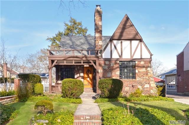 Beautiful Charming Tudor In The Heart Of Jamaica Estates. Character Throughout, Breath Taking Vaulted Ceilings With Exposed Beams In Living Room W/Frpl. Formal Dining Room, Oak Eik W/Granite Counters, 4 Large Bedrooms, Huge Basement With High Ceilings, Wine Room, Additional Space For Office/Gym. Lovely Backyard, Located 2 Blocks From, St. Johns University, Shopping, Etc!