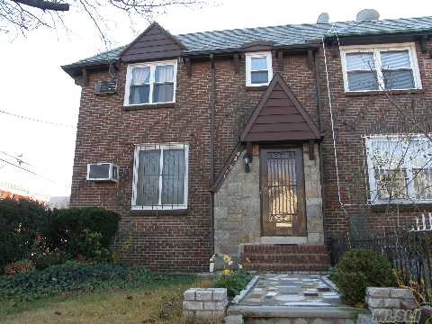 Renovated Tudor Semi Attached Home Features; Spacious Room Throughout, 5 Year Old Eik, 6 Month Old 2nd Floor Bath, Redone Hardwood Floors And New Carpeting In Bedrooms, Washer/Dryers Is 3 Years Old, Finished Basement With 1 Year Old Bath, 4 Year Old Hot Water Tank And Entrance To Rear Featuring Patio, 1 Car Garage + Private Carport And Common Driveway. Move Right In.